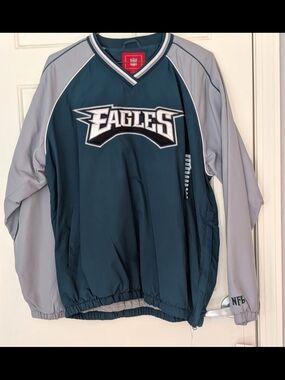 NFL Embroidered Logo Jacket Sleeve in Light Gray with Dark Green Stitching